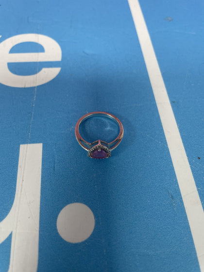 SILVER RING WITH PINK GEM.
