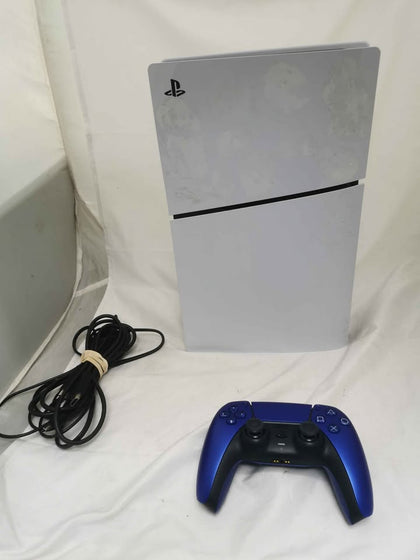 Playstation 5 Console Slim Console with Blue Dual Sense Controller sticker marks on side plates and orange stain on side