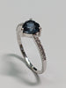 9CT WHITE GOLD RING WITH NAVY BLUE HEART STONE SIZE K