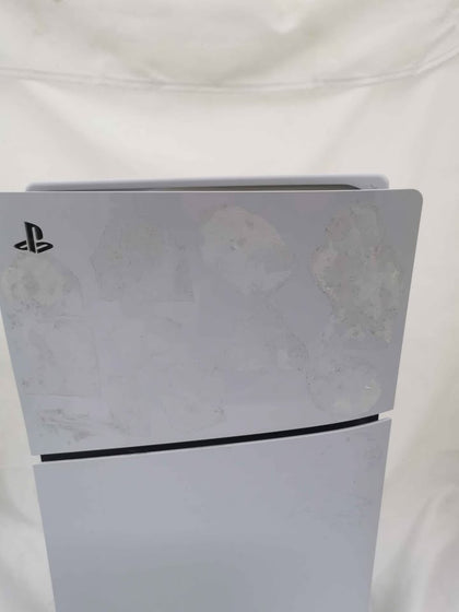 Playstation 5 Console Slim Console with Blue Dual Sense Controller sticker marks on side plates and orange stain on side