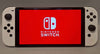 Switch Console, 64GB OLED + White Joy-Con, Discounted, minor scratch on screen