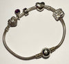 Pandora 8” Bracelet + 5 Charms