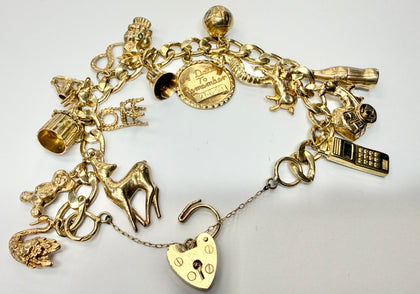 9ct yellow gold charm bracelet with safety chain