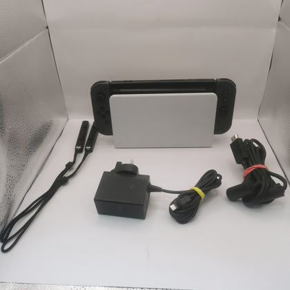 Nintendo Switch Console Hac-001(-01) 32gb Video Gaming Handheld with 2 grey joycons and a dock with chzarger included  item is unboxed