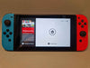 Nintendo Switch Console, 32GB + Neon Red/Blue Joy-Con