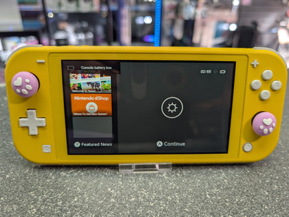 Yellow Nintendo Switch Lite Plus 2 Games