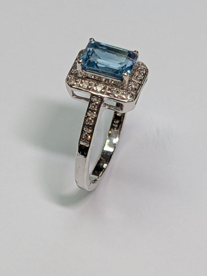 9CT White Gold Diamond And Blue Stone Ring - Size L