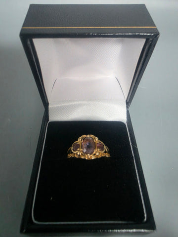 9CT Gold Ring 3.1G HM With Purple Stones Size L