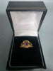 9CT Gold Ring 3.1G HM With Purple Stones Size L