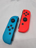 Nintendo switch Joy-Con Pair Neon red/blue with cradle