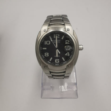 CITIZEN ECO-DRIVE E110-S009090-minor scratches on watch face and on strap