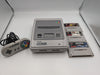 Super Nintendo console w/games