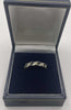 9ct gold ring with clear and black stones
