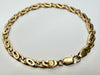 9ct yellow gold fancy link bracelet with an interlocking oval and loop design 8"