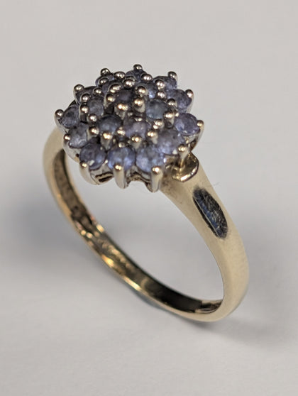 9ct gold ring with lilac stones