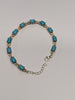 Silver diamond bracelet with turquoise stones