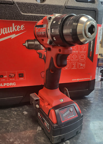 Milwaukee M18BLPDRC-502C 18V Brushless Cordless Combi Drill with 2 x 5.0Ah Li-Ion Red Lithium Batteries