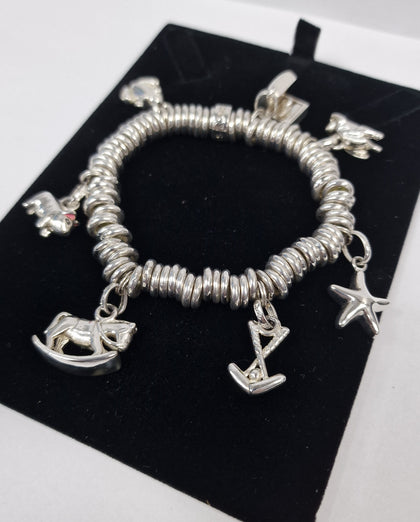 ***SALE*** Silver 925 105.2G CHARM BRACELET WITH 7 CHARMS