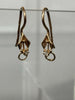 14K gold earrings hallmarked 1.55G **preowned **