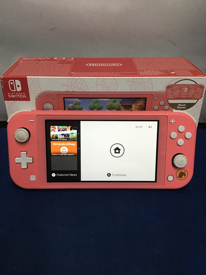 Nintendo Switch Lite (Coral) Animal Crossing New Horizons.