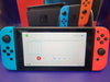 Nintendo Switch Console 32GB Neon Red/Blue Joy-Con Boxed. HAC-001-01