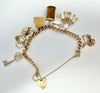 9ct yellow gold charm bracelet 7"