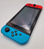 Nintendo Switch 32GB red/blue handheld gaming console with original charger joy-con grips and cradle BOXED