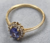 9ct Gold Ring with Purple/Clear Stones