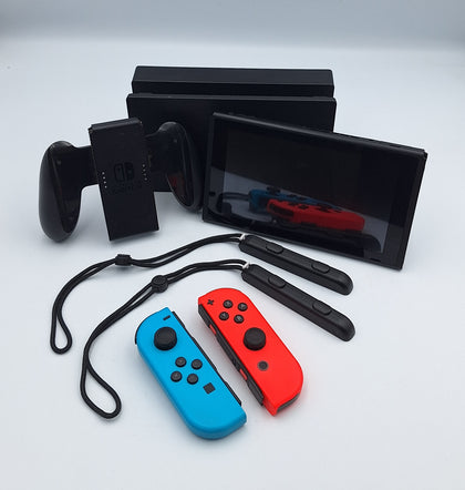 Nintendo Switch Console 32GB red/blue Joy-Con, dock, charger and controller cradle with all leads UNBOXED