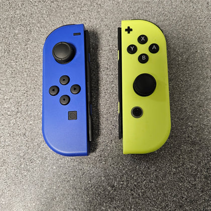 Nintendo Switch Joycons Blue (left) & Neon Yellow (Right)