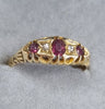 18ct gold Ring red and clear stones size S