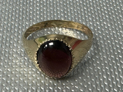 9ct Gold Ring set with Red Stone.