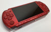 Sony PSP handheld console with charger and case
