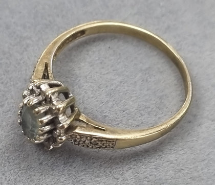 9ct Gold ring with stones.