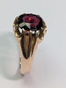 9ct gold ring with large red centre stone