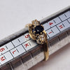 9CT GOLD DIAMOND AND BLACK STONE RING SIZE I.5 PRESTON STORE