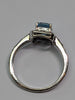 9CT WHITE GOLD DIAMOND & BLUE STONE RING