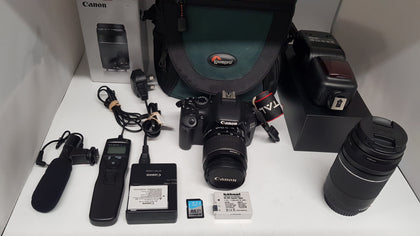 Canon EOS 550D 18.0mp Camera with 18 - 55mm Lens, 75 - 300mm lens, Charger & Bag