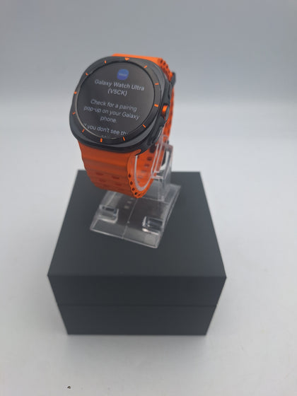 Samsung Galaxy Watch Ultra lte 47mm smartwatch with charger and orange strap