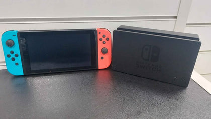 Nintendo Switch console 32GB with neon red & blue joy-con's with dose have scratch on the screen