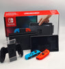 Nintendo Switch 32GB Console with red/blue Joy cons, Charger, dock and cradle BOXED
