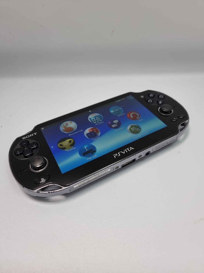 PS VITA PLUS 8 GAMES BUNDLE AND CHARGER UNBOXED  *Has a mark on a screen*