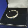 9 Karat 2.3 gram gold ring with Moissanite stones - size M box included
