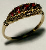9CT Gold Ring with Red Stones Size N