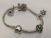 Pandora charm bracelet with charms