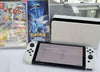 Nintendo Switch OLED + 2 Games + Case