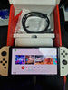 Switch Console, 64GB OLED + White Joy-Con