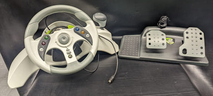 Xbox 360 bundle including controler games and steering wheel.