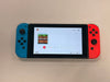 nintendo switch console red and blue joycons