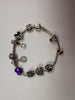 PANDORA CHARM BRACELET + 11 CHARMS LEYLAND STORE